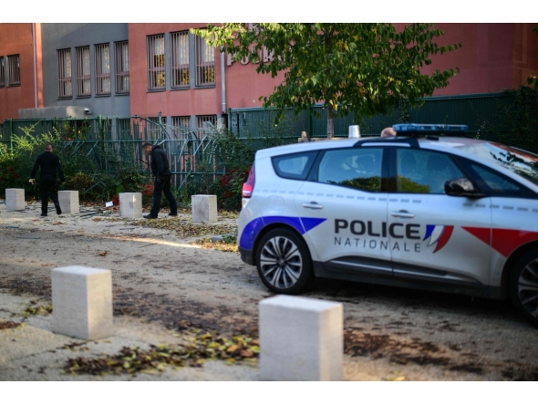 Members of the French Brigade de Recherche et d'Intervention (BRI - Research and Intervention Brigade) police unit check the scene of a robbery at a gold refining laboratory in Lyon, central-eastern France, on October 30, 2025. Photo by OLIVIER CHASSIGNOLE / AFP