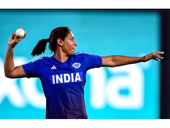 FILES) India's captain Harmanpreet Kaur attends a practice session at the Barsapara Cricket Stadium in Guwahati on September 29, 2025, on the eve of their 2025 ICC Women's Cricket World Cup one-day international (ODI) match against Sri Lanka.  (Photo by Biju BORO / AFP)