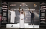 Qatar Racing Club's Director General Sheikh Jabor bin Khalid Al Thani poses for a photo with the podium winners.