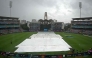 Raincovers are spread over the pitch before the start of the ICC Women's Cricket World Cup 2025 one-day international (ODI) final match in Navi Mumbai on November 2, 2025. (Photo by Punit Paranjpe / AFP) 