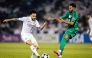 Al Sadd's Claudinho (left) vies for the ball with Al Ahli Saudi FC's Riyad Mahrez.