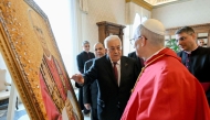 This photo taken and handout on November 6, 2025 by The Vatican Media shows Pope Leo XIV during a meeting with Palestinian President Mahmud Abbas in The Vatican. (Photo by Handout  / AFP) 