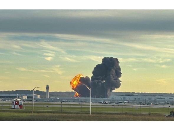 This handout photo courtesy of Levi Dean shows smoke and flames rising from the site of a UPS cargo plane crash outside Louisville International Airport in Louisville, Kentucky, on November 4, 2025. Photo by HANDOUT / Courtesy of X account @LeviDean98 / AFP