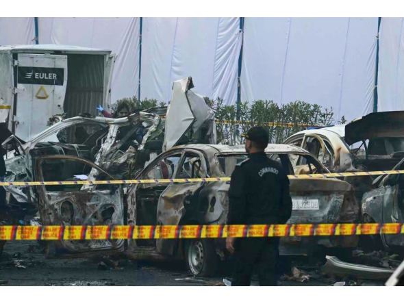 Forensic experts investigate at the blast site following an explosion near the Red Fort in the old quarters of Delhi on November 11, 2025. Photo by Arun SANKAR / AFP