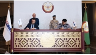 Chief of Staff of the Qatar Armed Forces, H E Lt Gen (Pilot) Jassim bin Mohammed Al Mannai, and Qatar Country Manager at Fincantieri, Aldo Zizzo, witness the signing of the agreement.