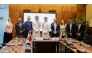 Executive Director of Motor Insurance at Qatar Islamic Insurance Group, Mohammed Al-Rasheed and Co-Founder of PayLater Mohammad Al Dulaimi with other officials during the signing ceremony.