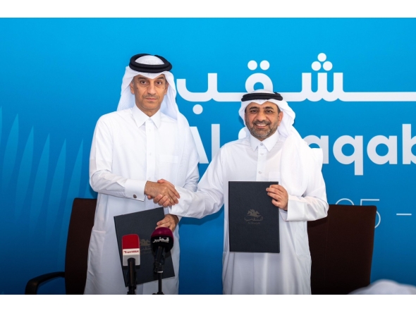 QIIB Deputy CEO Jamal Abdullah Al-Jamal and Al Shaqab Deputy CEO Khalid Al Hitmi pose for a photo after signing the agreement. 