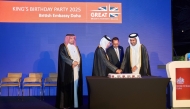 Minister of Commerce and Industry, H E Sheikh Faisal bin Thani bin Faisal Al-Thani; Minister of State for Foreign Affairs, H E Sultan bin Saad Al Muraikhi; Director of the Protocol Department at MoFA, H E Ibrahim Yousif Abdullah Fakhro; and Ambassador of the UK to Qatar, H E Neerav Patel cut the cake to celebrate the King's birthday. 