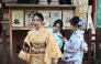 Chinese tourists adjust their kimono as they visit the Sensoji Temple in the Asakusa district of Tokyo on November 15, 2025. (Photo by Greg Baker / AFP)