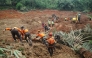 Rescuers search for survivors after a landslide buried some houses in Cibeunying village, Cilacap regency, Central Java, on November 14, 2025. Photo by Bakhtiar Rahman/ AFP