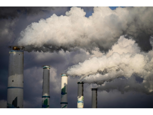 A general view shows exhaust gases billowing from the chimneys of the Taean Thermal Power Station, a large coal-fired power station owned by Korean Western Power Co, part of Korea Electric Power Corporation, in Taean, around 150 kilometers from Seoul, on November 17, 2025. Photo by ANTHONY WALLACE / AFP