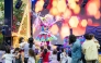 Children watching a performance at the Medina Centrale Carnival.
