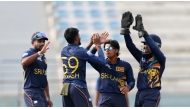 Sri Lanka A captain Dunith Wellalage (second right) celebrates with teammates. 