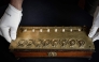 (Files) This photograph shows La Pascaline, first mechanical calculating machine invented by French polymathe Blaise Pascal displayed at the Christie's auction house in Paris, on September 11, 2025. (Photo by Stephane De Sakutin / AFP)