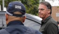 Former Brazilian President (2019-2022) Jair Bolsonaro leaves the DF Star hospital in Brasilia on September 14, 2025, after undergoing a series of medical examinations, as he remains under house arrest. Photo by Sergio Lima / AFP