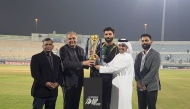Asian Cricket Council President Mohsin Naqvi and Qatar Cricket Association President Sheikh Abdulaziz bin Saoud Al Thani present the trophy to the Pakistan Shaheens captain Irfan Khan Niazi.