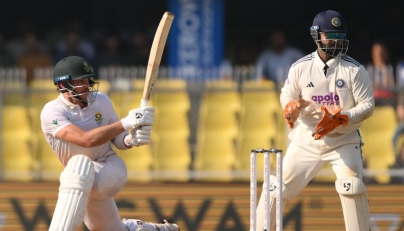 South Africa's Tristan Stubbs plays a shot during the fourth day of the second Test cricket match between India and South Africa at the Barsapara Cricket Stadium in Guwahati on November 25, 2025. (Photo by Biju Boro / AFP) 