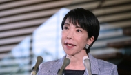 Japan's Prime Minister Sanae Takaichi answers questions from reporters about her telephone talks with US President Donald Trump at the Prime Minister's Office in Tokyo on November 25, 2025. (Photo by JIJI Press / AFP) 
