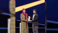 Chairperson of Qatar Foundation H H Sheikha Moza bint Nasser presenting the 2024–2025 WISE Prize for Education (first place) to Director of Product Engineering at Tumo Path, Vahakn Papazian, yesterday. 