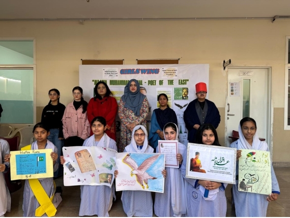Officials with students during the event.
