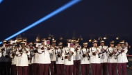 A Qatari band performs as part of the FIFA Arab Cub festivities at Katara.
