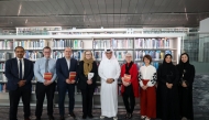 Minister of State and President of Qatar National Library H E Dr. Hamad bin Abdulaziz Al Kawari with other officials during the event.