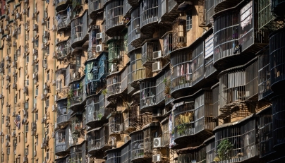 The Hou Kong residential building is seen in Macau on December 8, 2025. Macau's population is estimated around 710,000 across roughly 33 square kilometres, making it the world's most densely populated region. (Photo by Eduardo Leal / AFP)