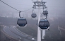 This photograph shows the first urban cable car in Ile-de-France region on the day of its official launch, in between Créteil Pointe du Lac et Limeil-Brévannes, on the outskirst of Paris, on December 13, 2025. (Photo by Thomas Samson / AFP)