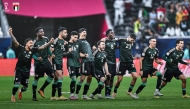 UAE players celebrate their victory over Algeria on Friday.