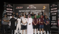 QRC Director General Sheikh Jabor bin Khalid Al Thani with champions and drivers of the second round and the judging panel. 