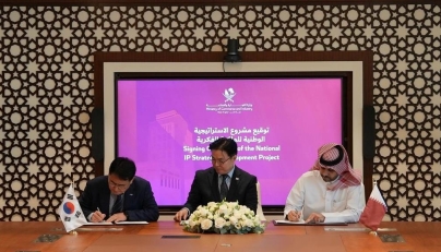 MoCI Undersecretary H E Mohammed bin Hassan Al-Malki with Minister of Intellectual Property H E Young-sun Kim and President of the Korea Intellectual Property Strategy Agency Byung-soo Yoon during the agreement signing ceremony.