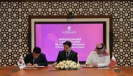MoCI Undersecretary H E Mohammed bin Hassan Al-Malki with Minister of Intellectual Property H E Young-sun Kim and President of the Korea Intellectual Property Strategy Agency Byung-soo Yoon during the agreement signing ceremony.