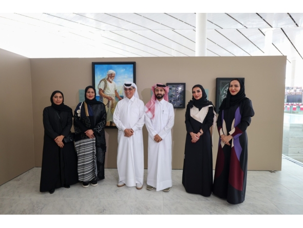 Minister of State and President of Qatar National Library H E Dr. Hamad bin Abdulaziz Al Kawari with artists and Library officials. 