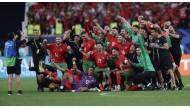 Morocco players and officials celebrate after reaching the FIFA Arab Cup final. PICTURE: Mohammed FaraG/The Peninsula