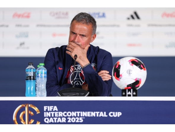 PSG coach Luis Enrique looks on during a press conference yesterday.