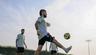 UAE players attend a training session in Doha.