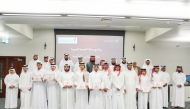 Ministry of Awqaf officials and the sponsored students.