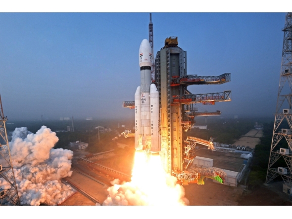 This handout photograph taken and released on December 24, 2025 by the Indian Space Research Organisation (ISRO) shows ISRO's launch vehicle LVM3-M6 carrying the United States’ next-generation BlueBird Block-2 communication satellite of AST SpaceMobile lifting off from the launch pad at the Satish Dhawan Space Centre in Sriharikota in India's Andhra Pradesh state. (Photo by Indian Space Research Organisation (ISRO) / AFP) 