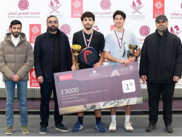 Officials with the champions of the tournament.