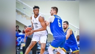 Al Sadd's Malik Antonyo Toppin (left) in action during the match against Al Gharafa. 