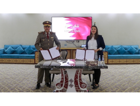 Acting Commander of the Language Institute, Brig Khalid Hamad Al-Kaabi, and Deputy Director of the French Institute, Margaux Girard during the signing ceremony.
