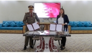 Acting Commander of the Language Institute, Brig Khalid Hamad Al-Kaabi, and Deputy Director of the French Institute, Margaux Girard during the signing ceremony.
