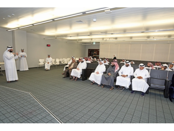 Officials from the Ministry of Awqaf and Islamic Affairs and the Ministry of Education and Higher Education, and selected students attend a briefing on the Umrah programme. 