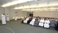 Officials from the Ministry of Awqaf and Islamic Affairs and the Ministry of Education and Higher Education, and selected students attend a briefing on the Umrah programme. 