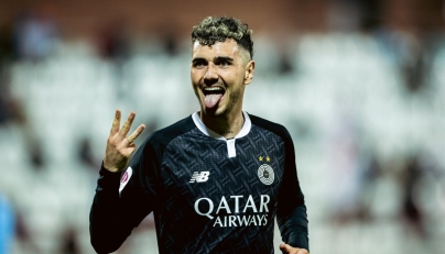 Al Sadd's Rafa Mujica gestures after completing his hat-trick. 