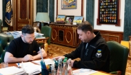 This handout photograph taken and released by the Ukrainian Presidential Press Service on January 2, 2026 shows Chief of the Military Intelligence of Ukraine Kyrylo Budanov (R) meeting with Ukraine's President Volodymyr Zelensky in Kyiv. (Photo by Handout / Ukrainian Presidential Press Service / AFP) 