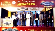 Officials during a grand Mega Draw of Rawabi Hypermarket.