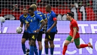 Morocco's forward #10 Brahim Diaz (R) celebrates scoring his team's first goal during the Africa Cup of Nations (CAN) round of 16 football match between Morocco and Tanzania at Prince Moulay Abdallah Stadium in Rabat on January 4, 2026. (Photo by Gabriel BOUYS / AFP)