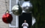 Pope Leo XIV delivers a speech to pilgrims from the window of the apostolic palace overlooking St. Peter's square during his Sunday Angelus prayer at the Vatican on January 4, 2026. (Photo by Filippo MONTEFORTE / AFP)