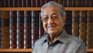 This picture taken on May 5, 2025 shows Malaysia's former prime minister Mahathir Mohamad posing for a picture at his office in Putrajaya. Photo by Mohd RASFAN / AFP